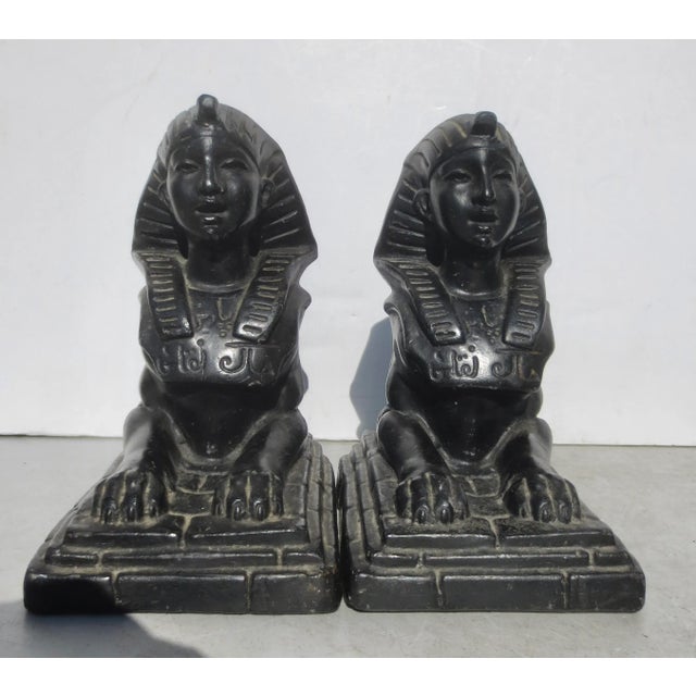 Mid-century Sphinx models from classic Egyptian architectural models. Black enamel over resin or plaster matrix....