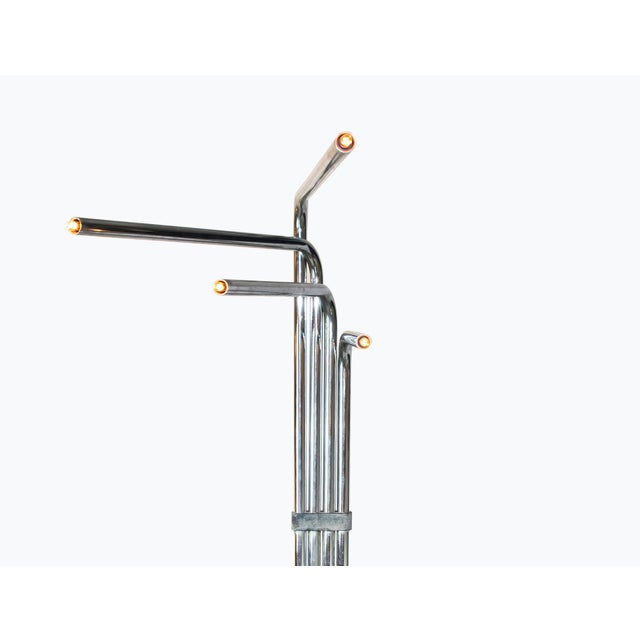 This vintage chrome floor lamp is an elegant design lamp designed by Goffredo Reggiani. A superb chromed floor lamp...