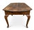 French Provincial Louis XV Farmhouse Table. It features a rustic plank top with breadboard ends, a simple unadorned apron,...