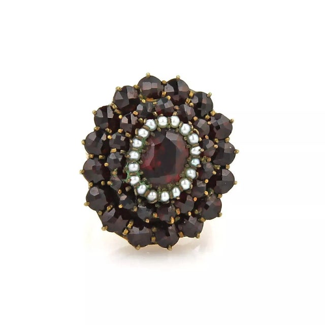 This stunning vintage cluster ring, it is crafted from solid 14k yellow gold with fancy scroll engraving around the shank...