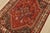 An authentic vintage tribal Shiraz rug hand-knotted with fine wool and natural dyes. This nomadic rug features a central...