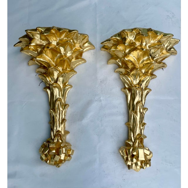 Golden glow for your home, our signature palm sconces now shine in elegant gold leaf, made by a Florida local artist....