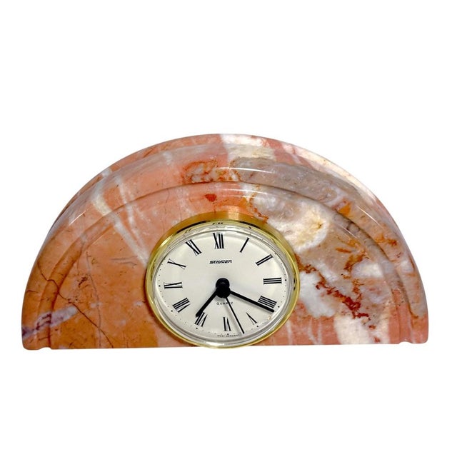 Art Deco desk or shelf clock with a marble base, blending warm pink tones and functional quartz movement. • Half-moon pink...