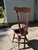 Antique adjustable piano or organ chair by the Chas. Parker Co. of Meriden, Connecticut, circa 1900. It has a spindle...