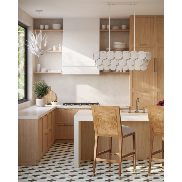 Marjorie Skouras designed the Tulum Oval Chandelier, inspired by the tropical beauty of the Yucatan Peninsula where she...