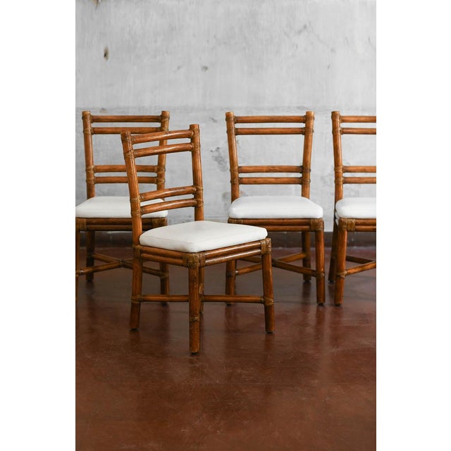 Set of 4 elinor and john mcguire chairs in rattan with leather bindings and leather cushions, 1970 product details set of...