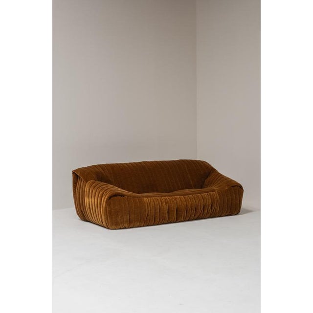 An iconic Sandra three-seater sofa designed by Annie Hiéronimus for Cinna, France, during the 1970s. with its generously...