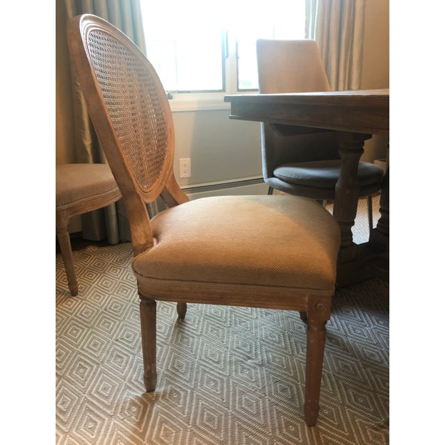 French cane back dining chairs from Bissett and bought from Horchow. Lt grey herringbone fabric. Very soft. 38"H x 21"W x...