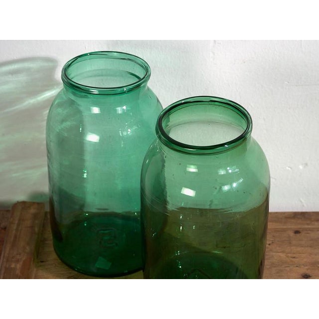 Antique green vases (c.1920) Style: French Provincial Materials and techniques: Glass Place of origin: France Epoch: Early...