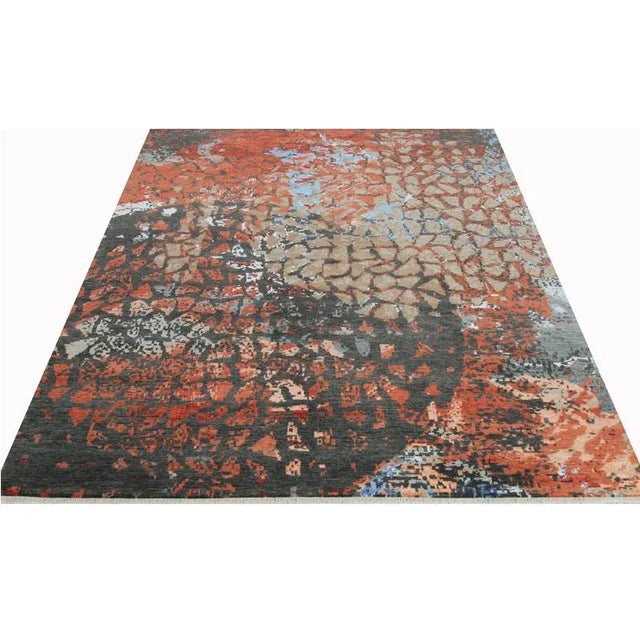 This stunningly beautiful handwoven modern abstract area rug is an excellent choice for anyone wanting a striking...