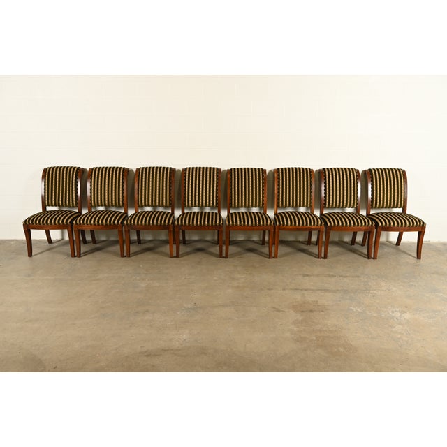 An outstanding set of eight French Empire, Neoclassical, or Regency style dining chairs By Henredon USA, Late 20th Century...