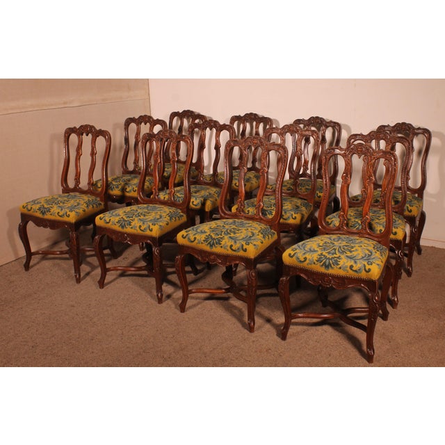 Superb large set of 12 Louis XIV style chairs from the early 20th century A very beautiful, rare and important set with a...