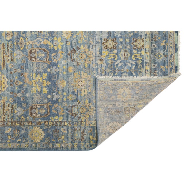 Bring timeless elegance into your home with this stunning, hand-knotted Apadana's modern Tabriz-style area rug. Crafted...