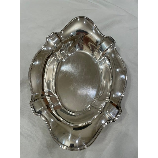 Overview Elevate your tablescape or silver collection with this exceptional antique Art Nouveau period sterling silver...