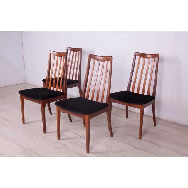 This set of four dining chairs was produced by G-Plan in the United Kingdom circa 1960. It was designed by Leslie Dandy....