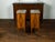 A pair of Italian walnut tables from the mid 19th century, with variegated marble top, single door and butterfly veneer....