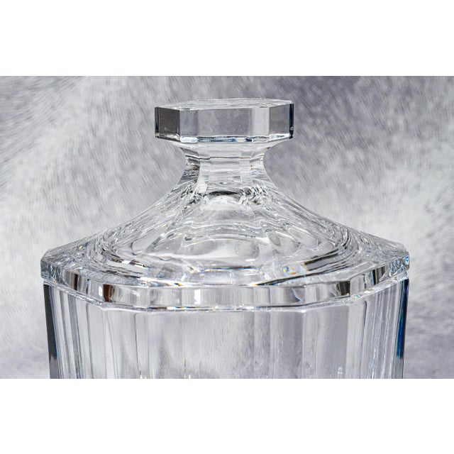 This substantial faceted crystal biscuit jar from Orrefors Sweden, designed by the renowned Olle Alberius, is a luxurious...