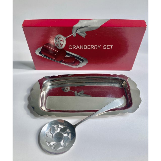 Vintage handcrafted two piece W. M. Rogers Silver Plate Cranberry Set. Featuring a rimmed and scalloped rectangular Tray,...