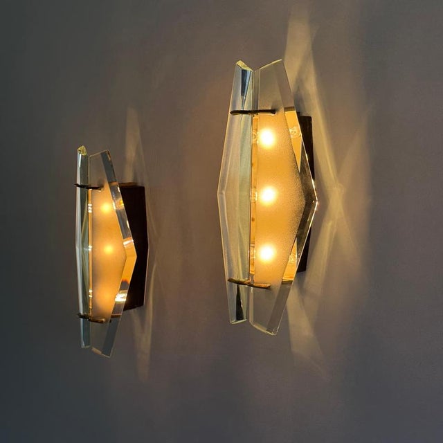 A rare and atmospheric pair of wall lights, model 1937, designed by max ingrand for fontana arte in the late 1950s — an...