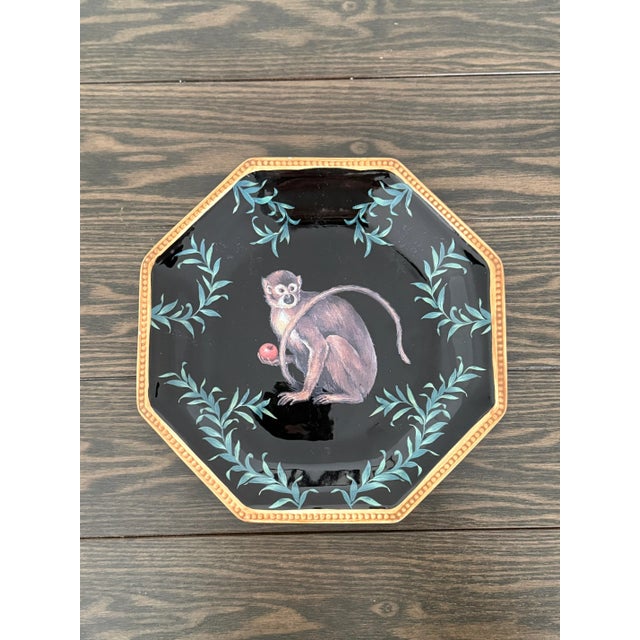 Boho chic safari inspired plates with angled bamboo edges. Understated green fauna motif throughout each design for a...