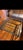 1990’s handsome iron and beveled glass coffee table with green patina. The glass is very substantial. There is no...