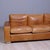 Beautiful and original three-seater sofa, in leather, artisan production, cushions with removable covers. Dimensions:...