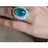 this is an amazing ring with diamond : 1.65 carats emerald : 14.70 carats gold : 6.790 gms