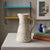 We absolutely love this 1950s pitcher. We adore its joyful modernity, its slightly bucolic whimsy, and above all, the...