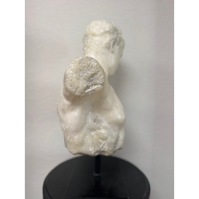 A striking discontinued sculpture from RH (Restoration Hardware), originally offered as the Roman Discus Thrower Sculpture...
