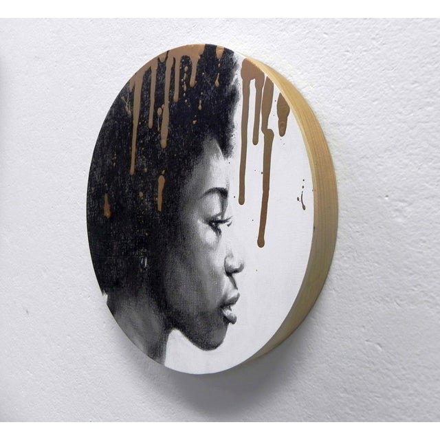 This artwork features a striking profile of a figure, rendered in charcoal and pastel, showcasing rich textures and...