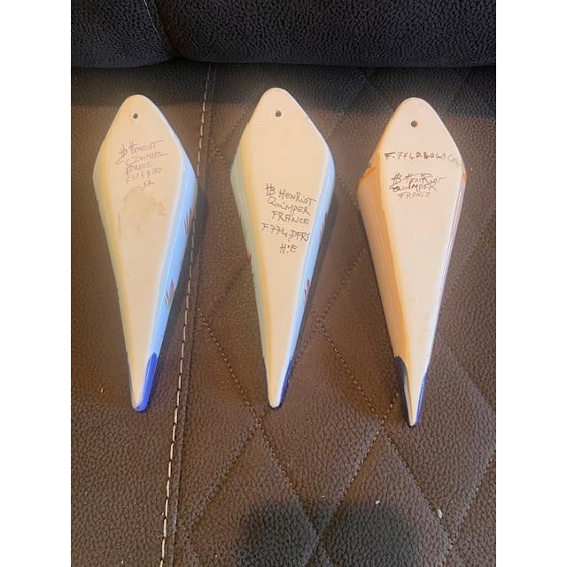 These vintage ceramic wall pockets, traditionally known as "bouquetieres murales", are handcrafted in Quimper, France....