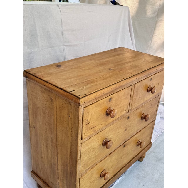 This is a lovely antique pine chest! This piece dates to the 19th century and has lovely patina. The wood has a warm glow,...