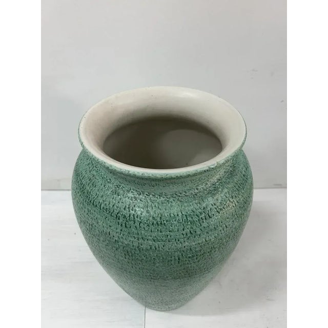 Large ceramic vase, also usable as an umbrella stand. dimensions: h 46 cm w 27 cm d 27 cm. The product is completely...