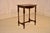 Period Edwardian oak side table from England, circa 1900. The top of this piece is nicely grained and has a beveled edge,...