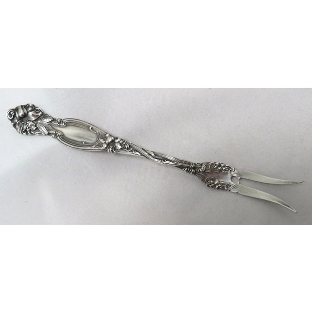 This is a Beautiful - Very Fine Quality Antique American Sterling Silver Pickle & Olive Serving Fork. It Is Done In A...