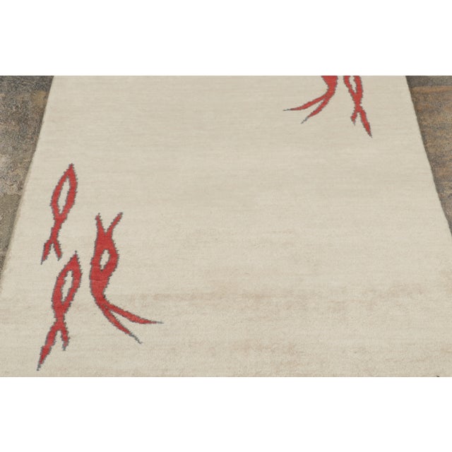 This 3x13 Art Deco pictorial runner features stylized fish motifs in vivid red with charcoal outlines set against an ivory...