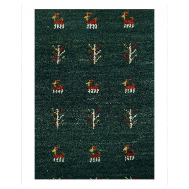 Gabbeh rugs are made by the nomadic Qashqai tribes of southern fars. They are rough cut and long piled rugs of rich color...