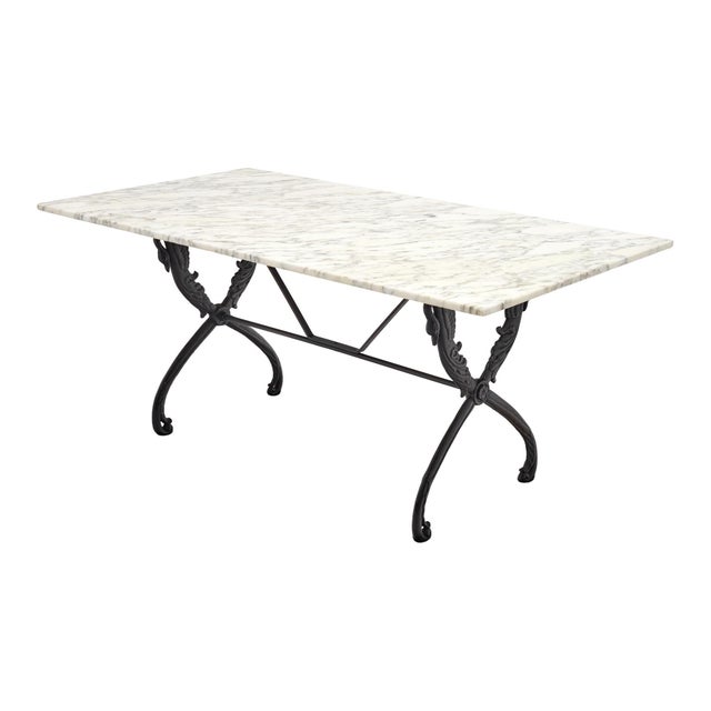 Garden table from the Art Deco period in France. This table has a beautiful, original Carrara marble slab top with lovely...