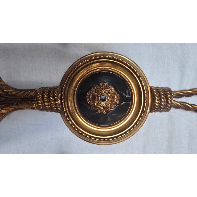 Louis XVI style 20th-century revival reproduction Tassle sconce pair (from the 1950s to 1970s) produced in Italy and...