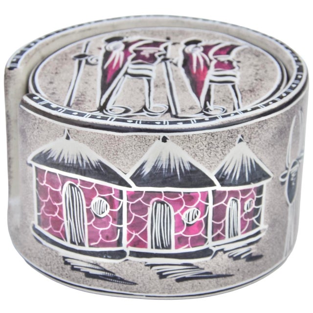 Impressive vintage West-African set of six coasters and matching box, thoughtfully handmade in a round silhouette with...