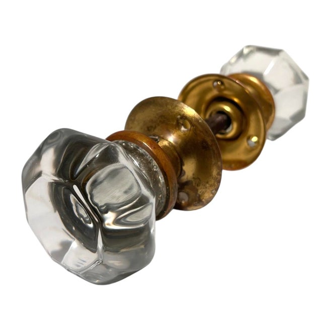Add a classic touch to your door with this beautiful pair of early 1900s American octagonal glass door knobs with center...