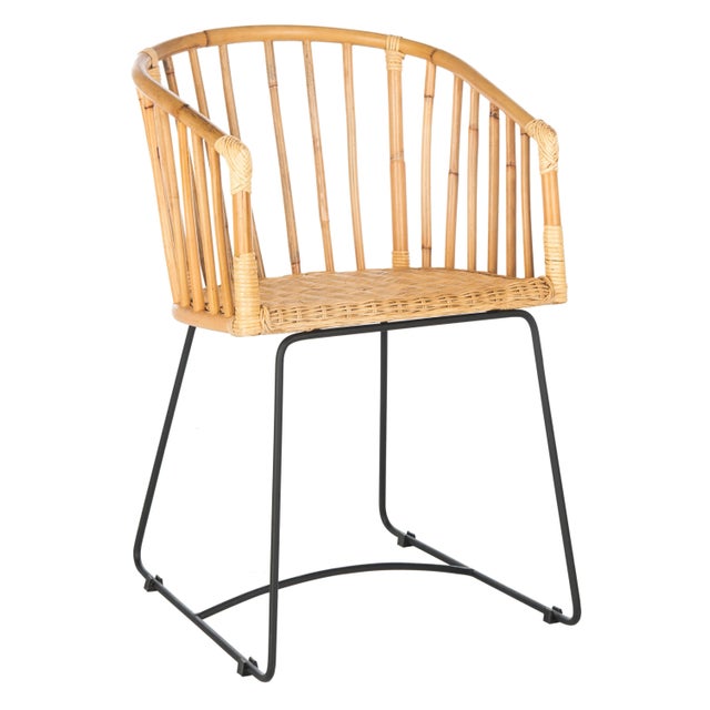 This contemporary rattan barrel dining chair is the natural choice to instantly upgrade any dining room. Designed to...