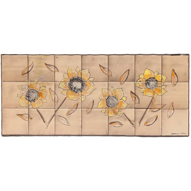 Low table. Wrought iron base attributed to Jacques Adnet. Ceramic tray the wheel. Sunflower patterns. Vallauris Circa 1950