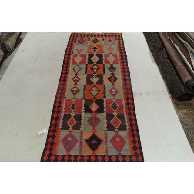 Handwoven in wool, this vintage Kilim is the latest unveiled from R&K Principal Josh Nazmiyal’s coveted treasury of...