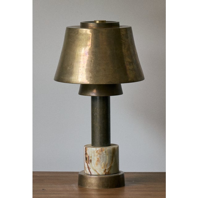 Vintage brass and marble table lamp. This table lamp features a brass shade and stem, both with the perfect patina, which...