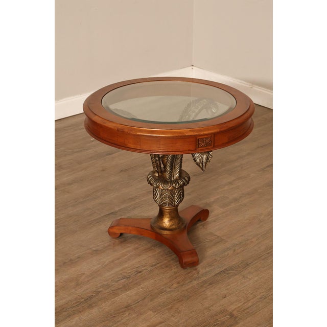 Decorative Round Accent Table Of Unknown Maker. Featuring A Circular Glass Insert Top Set Within A Wood Frame. Supported...