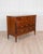 A refined Italian 18th century Directoire chest of drawers, beautifully crafted in warm cherrywood with elegant...