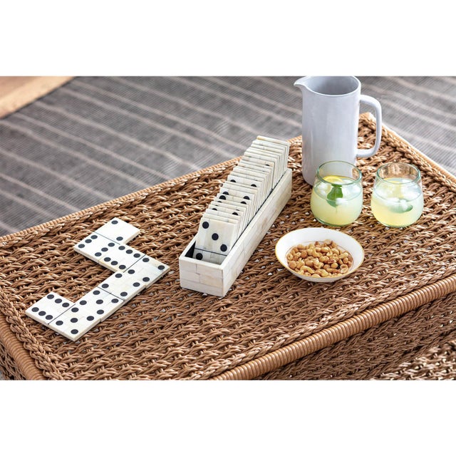 A beautiful piece of functional decor, this Domino Set is anything but ordinary. The domino pieces are real, white bone...
