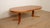 This beautiful vintage extendable dining table from Denmark is finished in warm teak and has an extendable design. At its...