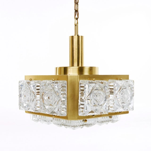 - Brass construction with pressed glass elements - Designed in the 1960s in Sweden by Carl Fagerlund for Orrefors...